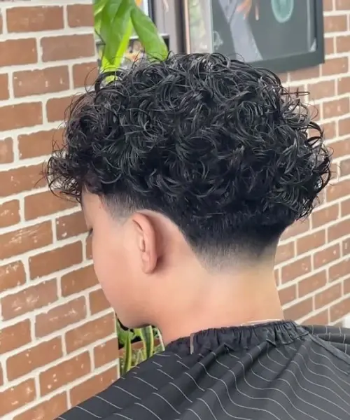 Low Taper Fade Haircut: Complete Guide for Men in 2025 2 Low Taper Fade with Curly Hair