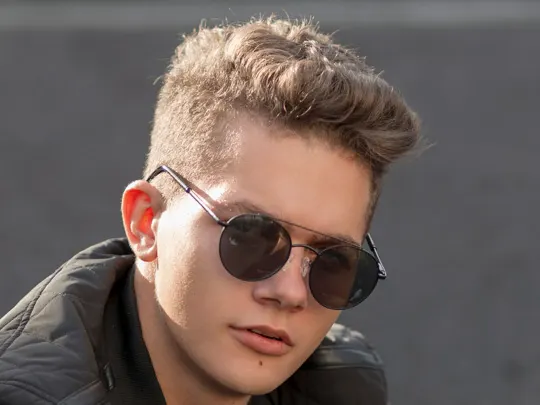 The Ultimate Guide to Undercut Hairstyles (2025 Edition) 22 Wavy Hair Undercut