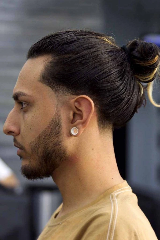 The Ultimate Guide to Low Fade Haircuts in 2025 17 Low Fade Man Bun Haircut